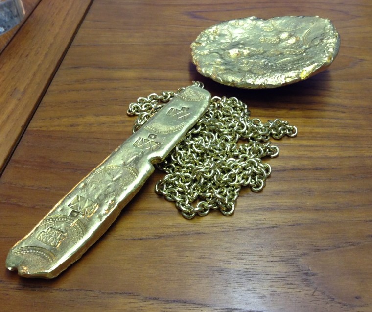 Gold bars with gold linked chain