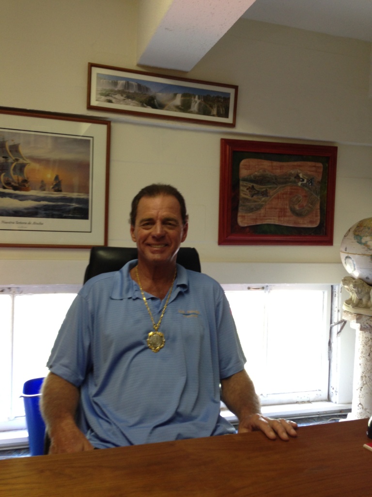 Kim Fisher wearing an amazing treasure coin